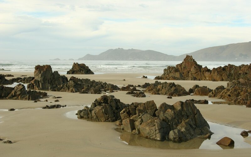 Rocky Beach with Ocean — Beige