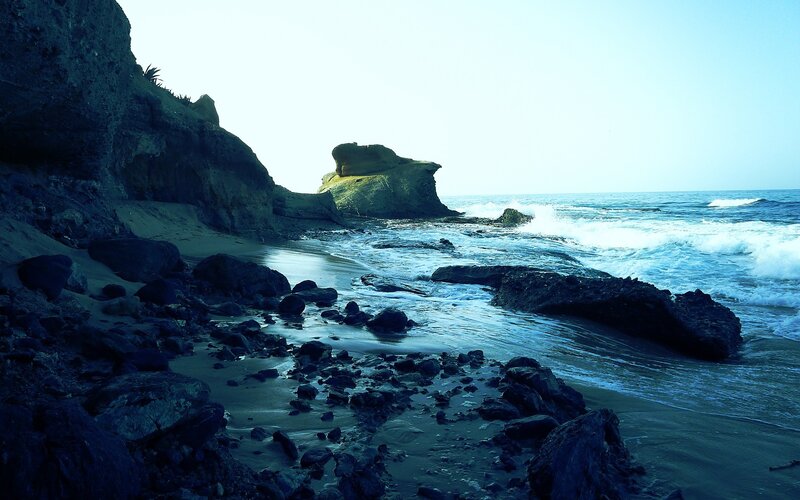 Rocky Beach with Ocean — Blue, Serene, Afternoon, Photograph, Rocks, Cliff, Gray