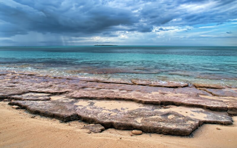 Rocky Beach with Turquoise Water — Blue, Dramatic, Afternoon