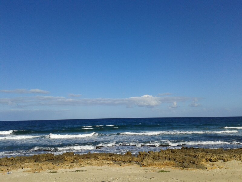 Rocky Beach with Waves — Blue, Calm