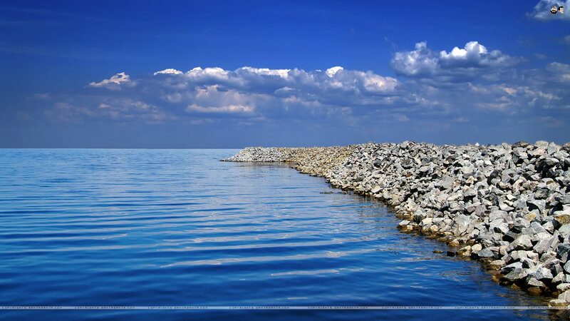 Rocky Breakwater in Sea