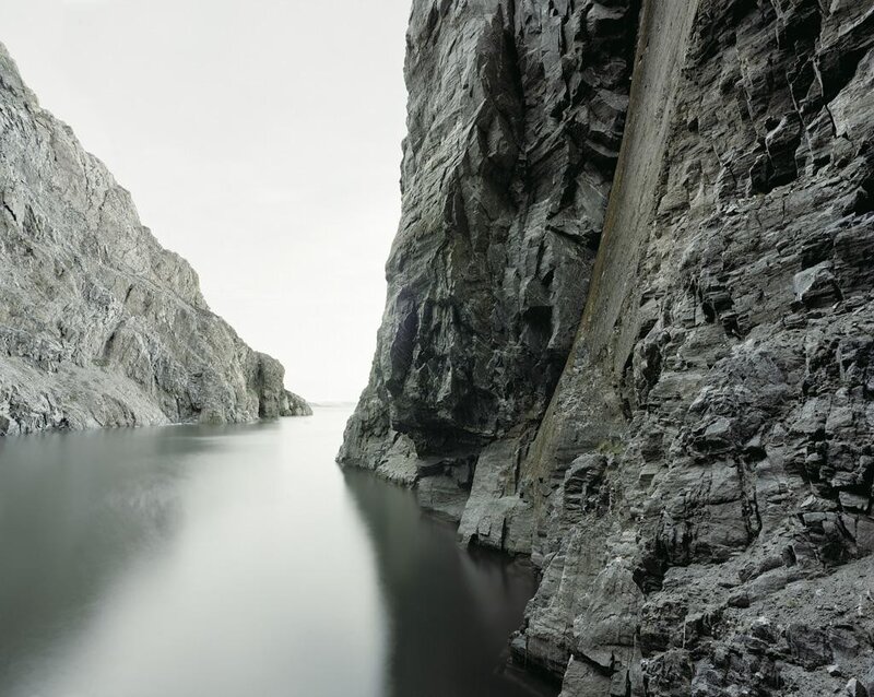 rocky canyon with calm water