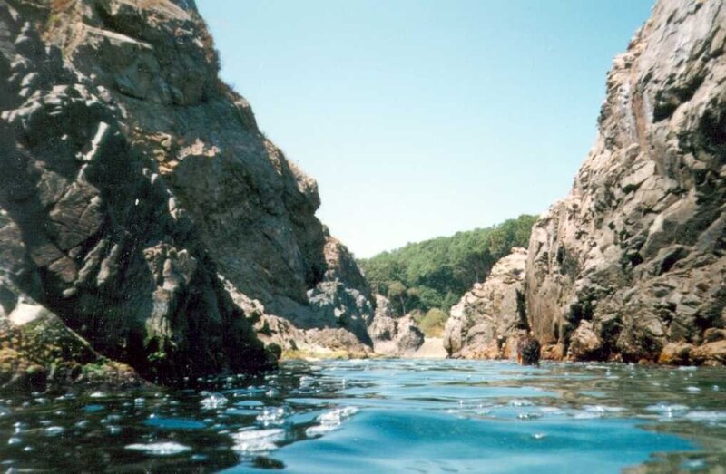 rocky canyon with calm water
