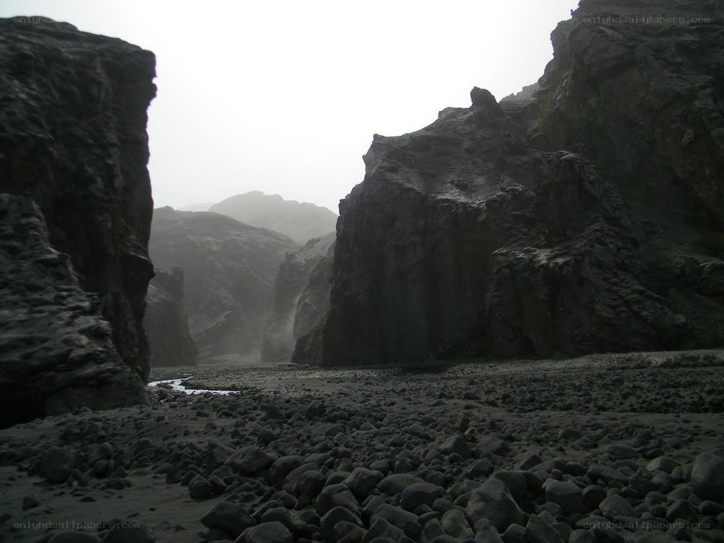rocky canyon with stream