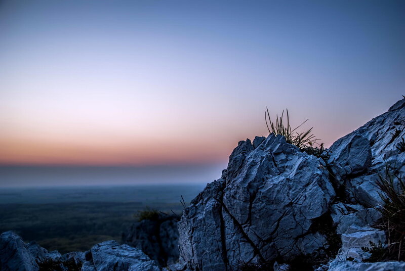Rocky Cliff at Dusk — Blue
