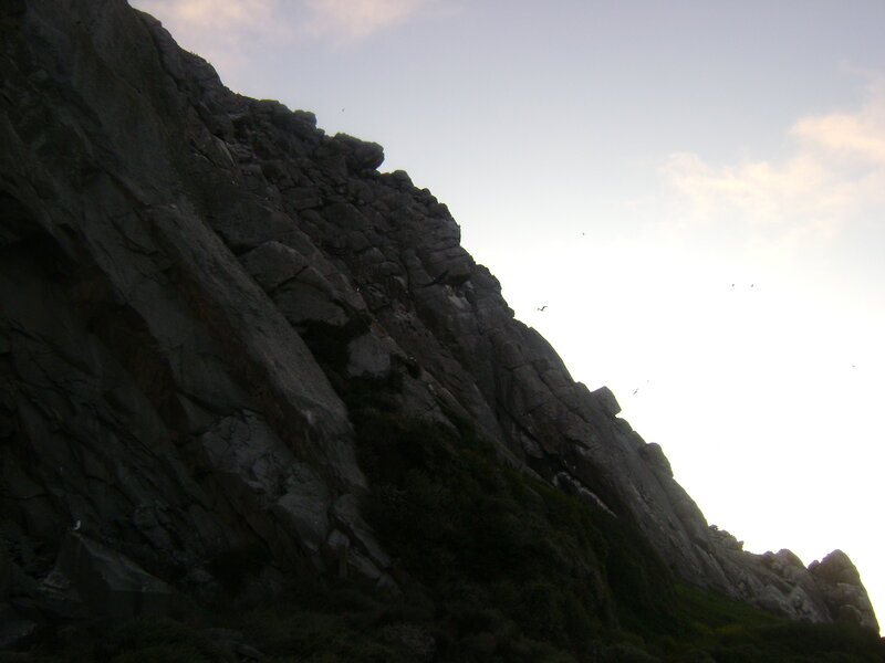 rocky cliff at dusk