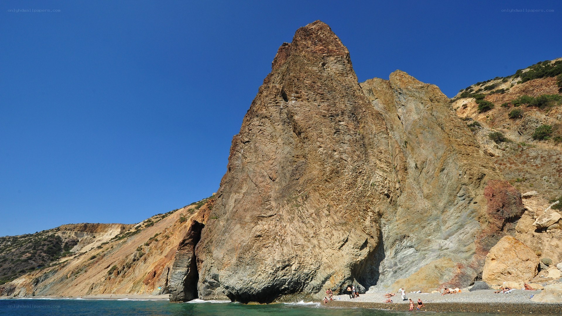 Rocky cliff at seaside beach