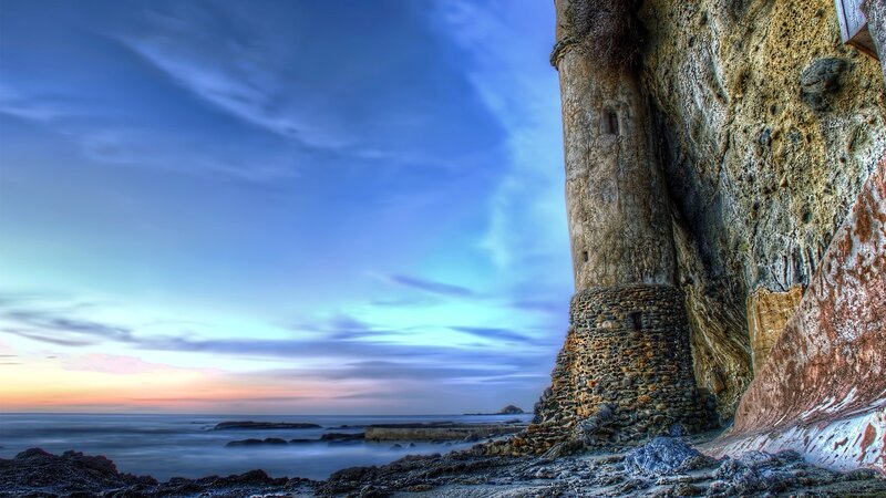 Rocky Cliff at Sunset — Blue