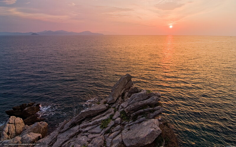 Rocky Cliff at Sunset — Orange, Serene, Photograph