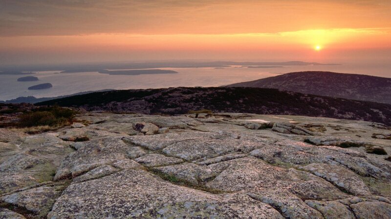 Rocky Cliff at Sunset — Orange, Serene