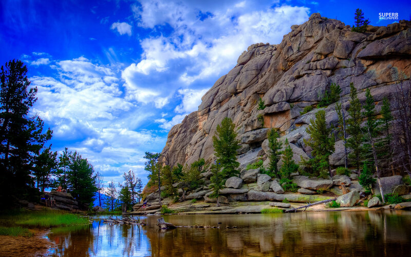 Rocky Cliff by Lake — Blue, Dramatic, Afternoon, Photograph
