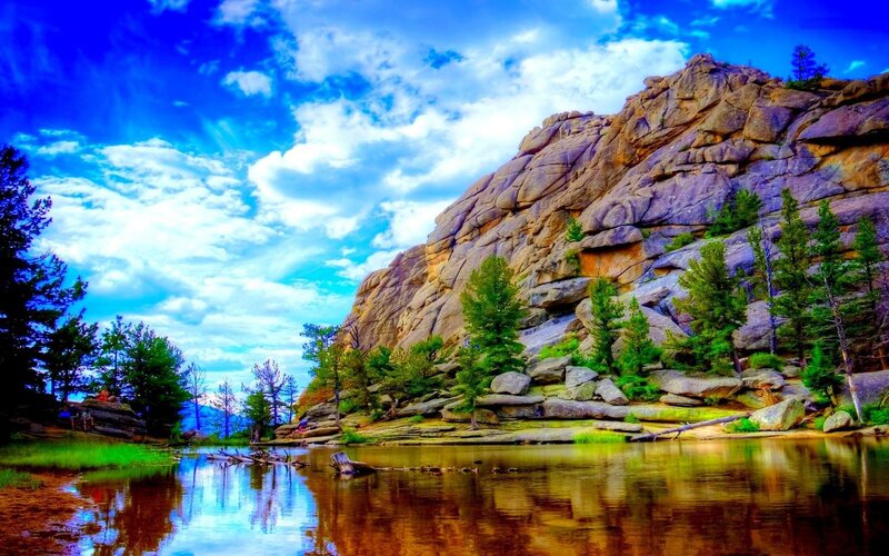 Rocky Cliff by Lake — Blue, Dramatic, Afternoon