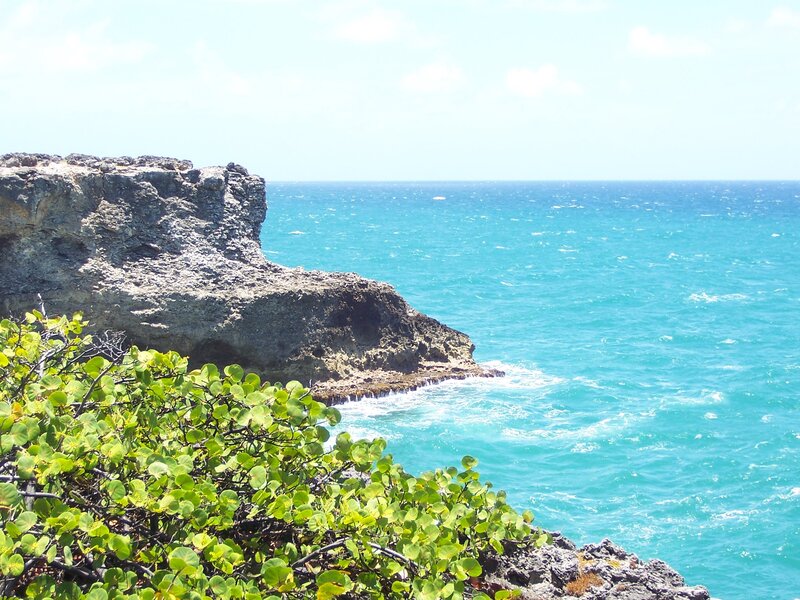 Rocky Cliff by Ocean — Blue, Serene, Afternoon