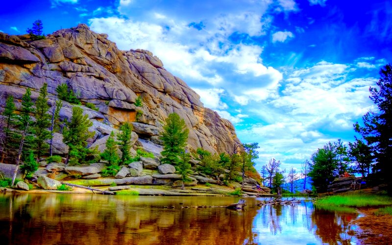 Rocky Cliff by River — Blue, Dramatic