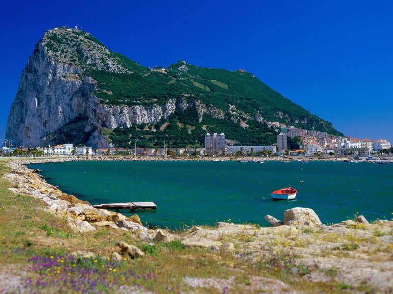 Rocky Cliff by Sea — Blue, Serene, Afternoon, Photograph