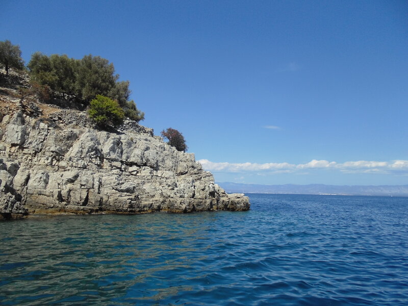 Rocky Cliff by Sea — Blue