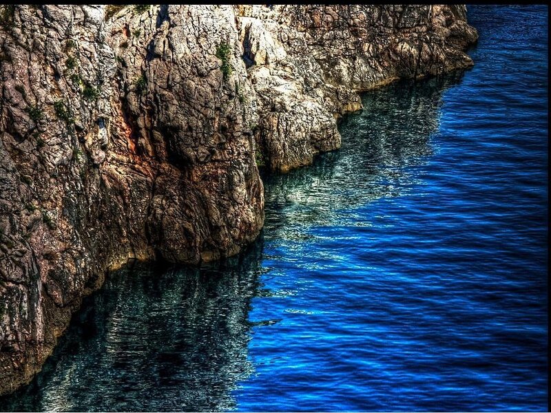 Rocky Cliff by Sea