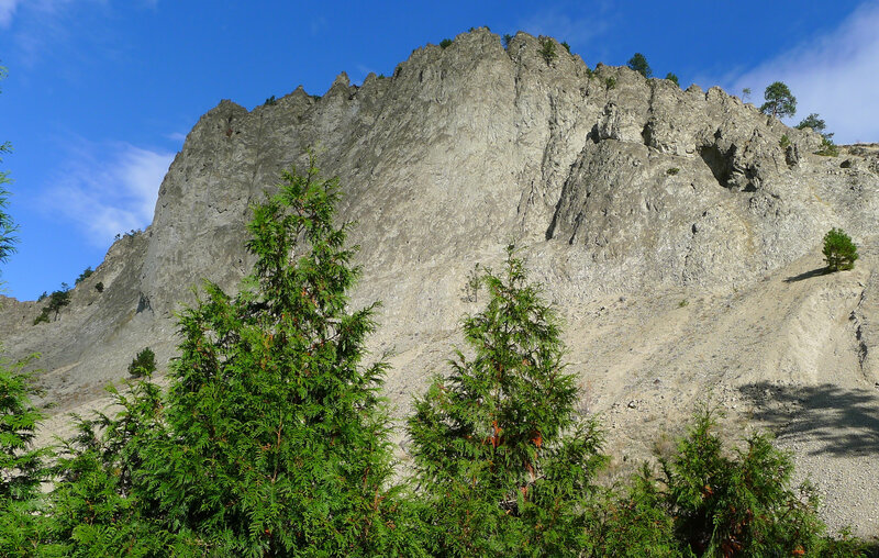 Rocky Cliff Face — Blue, Serene, Afternoon