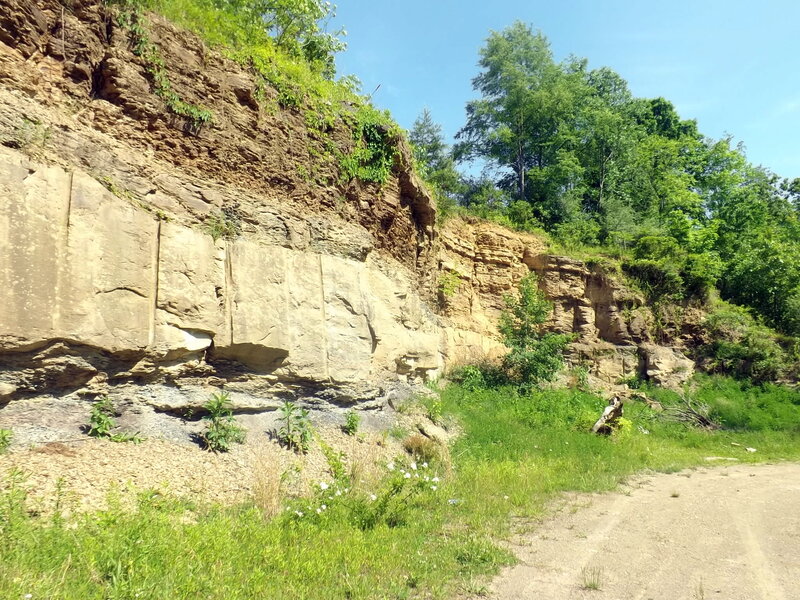 Rocky Cliff Face — Green, Serene, Afternoon