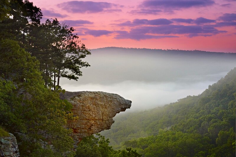 Rocky Cliff over Fog