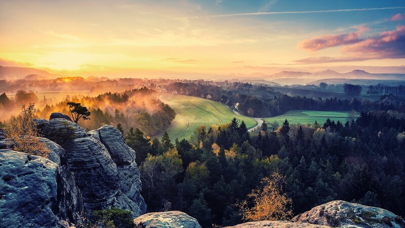 Rocky Cliff Overlooking Valley — Orange, Serene