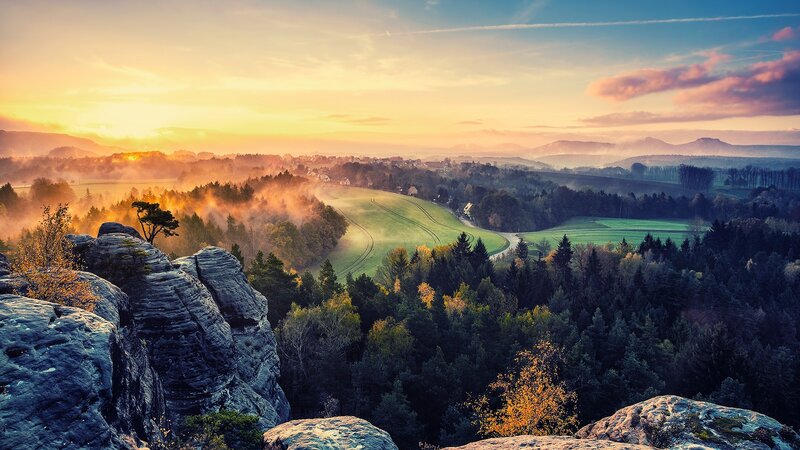 Rocky Cliff Overlooking Valley — Orange