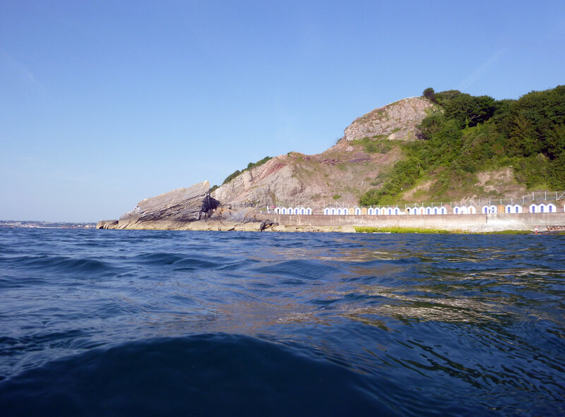 Rocky Cliff with Beach Huts