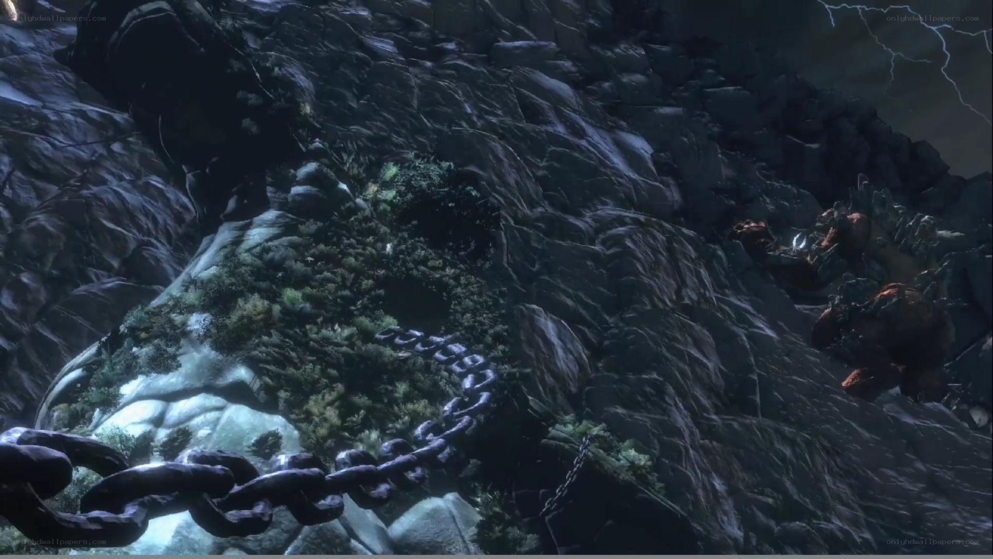 rocky cliff with chains