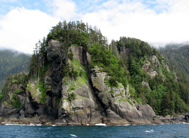 Rocky Cliff with Trees — Green, Serene, Afternoon