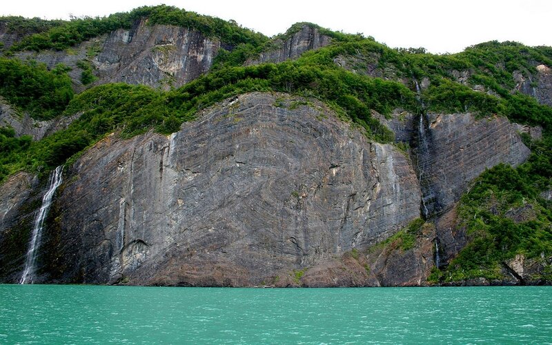 Rocky Cliff with Waterfall — Green, Serene