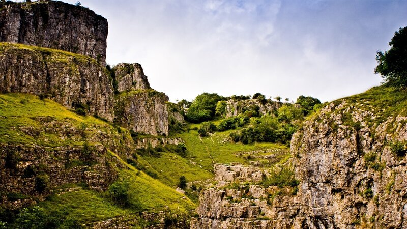 Rocky Cliffs and Green Valley