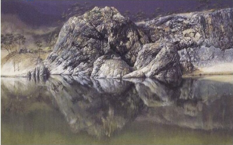 Rocky cliffs reflected in water