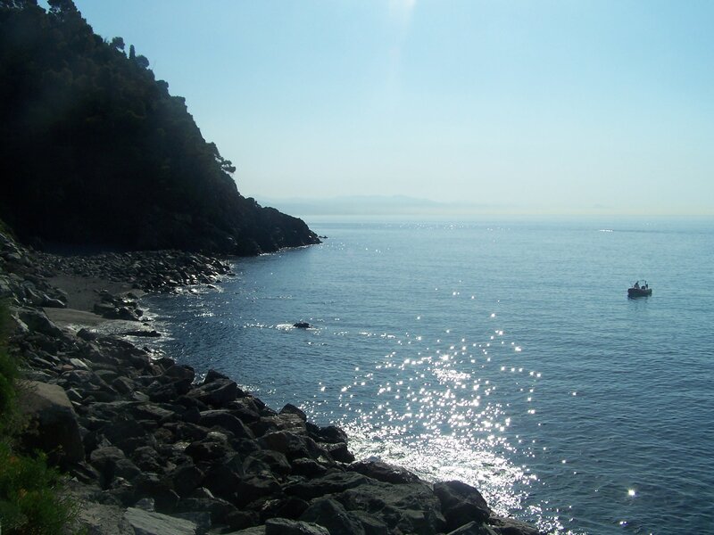 Rocky coast with fishing boat