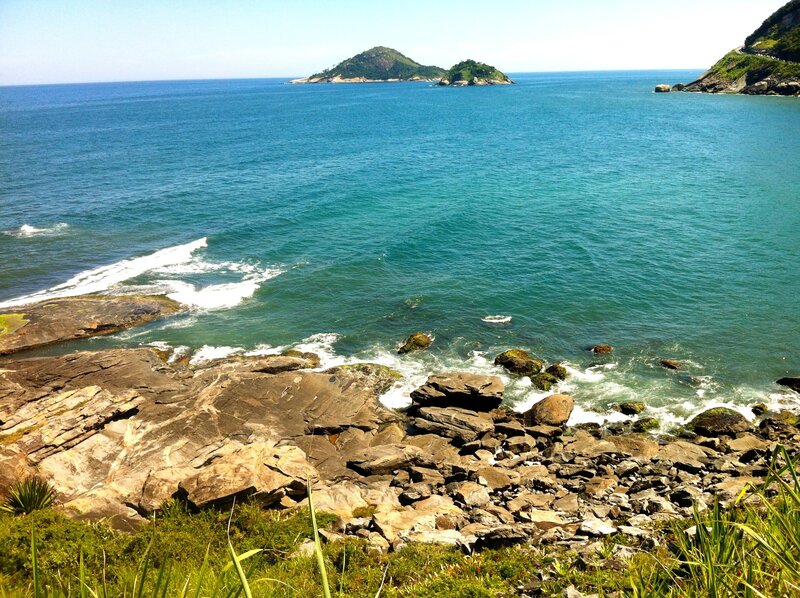 Rocky coast with islands in distance