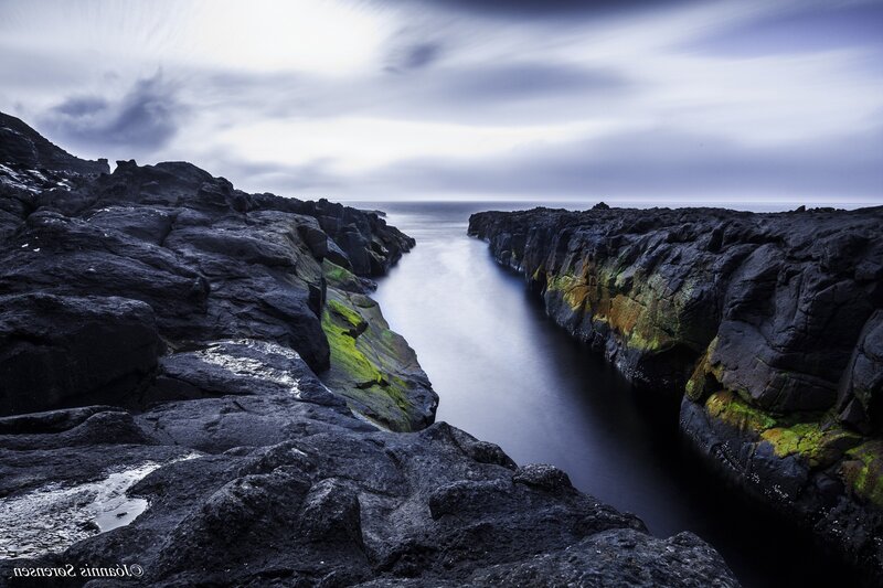Rocky Coastal Channel — Blue