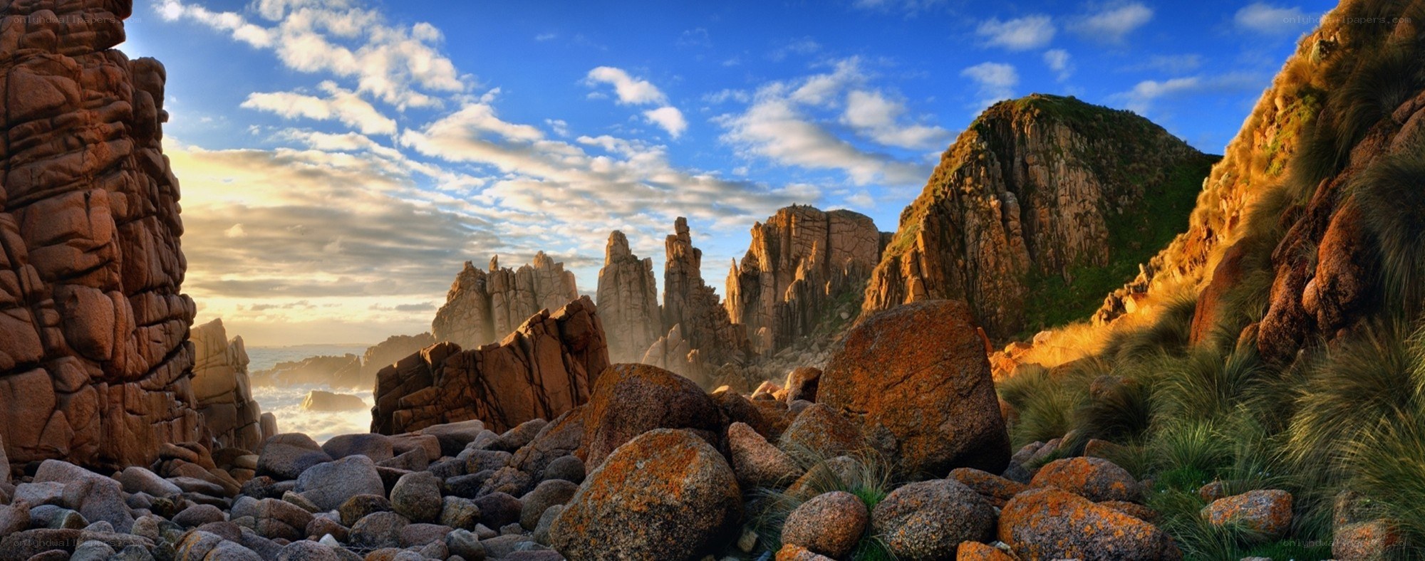 Rocky coastal cliffs at sunset