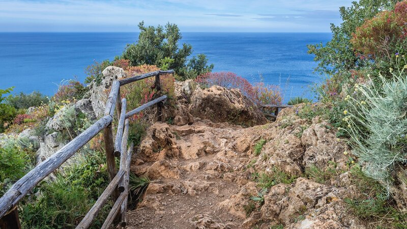 Rocky Coastal Path — Blue, Serene