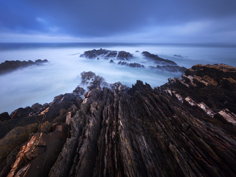 Rocky Coastline at Dusk — Blue, Dramatic, Night, Photograph, Rocks, Ocean, Sky, Gray, Black