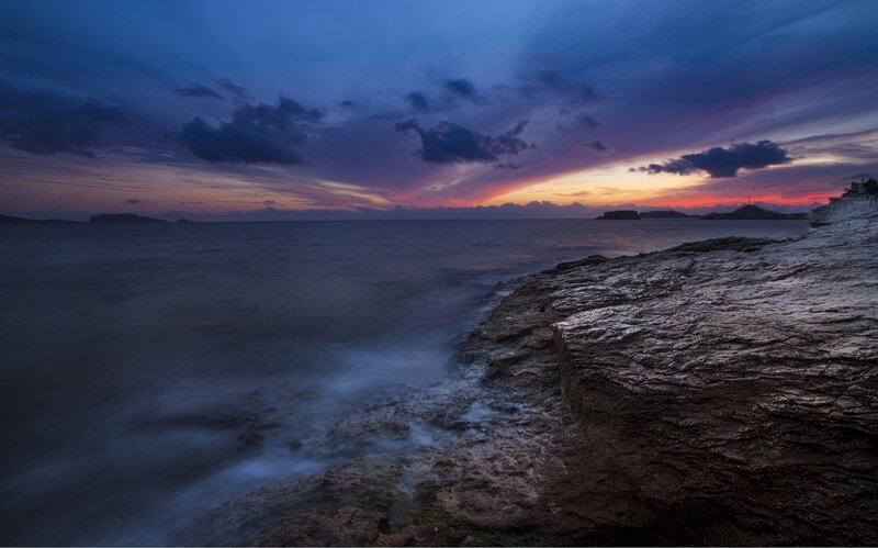 Rocky Coastline at Dusk — Blue, Dramatic, Sunset, Photograph, Ocean, Sky, Clouds