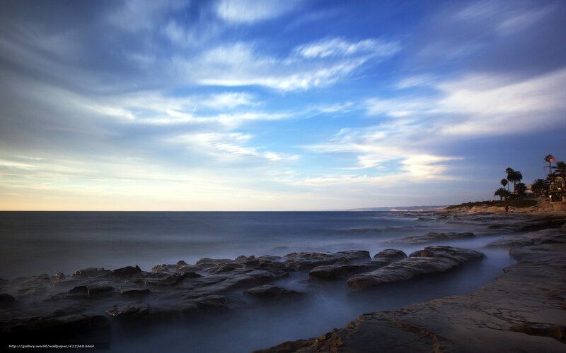 Rocky Coastline at Dusk — Blue, Serene, Photograph, Ocean, Clouds