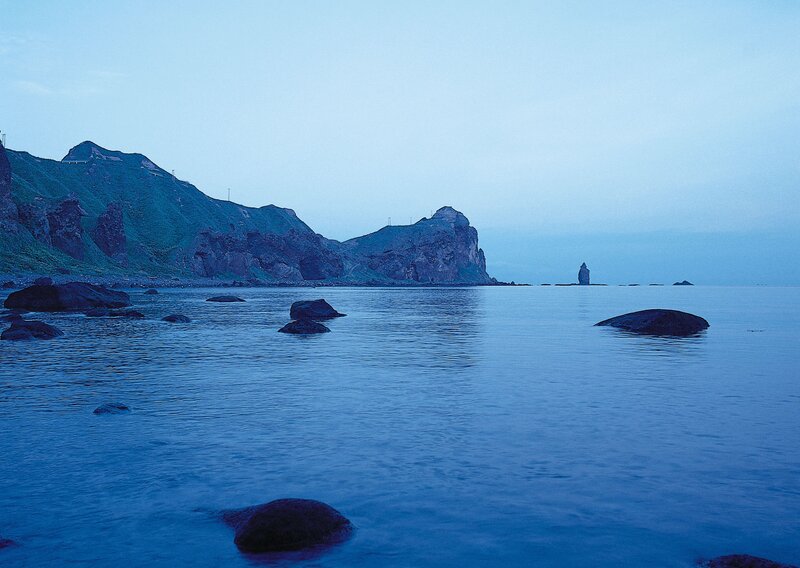 Rocky Coastline at Dusk — Blue, Serene, Photograph, Rocks, Sea, Mountain