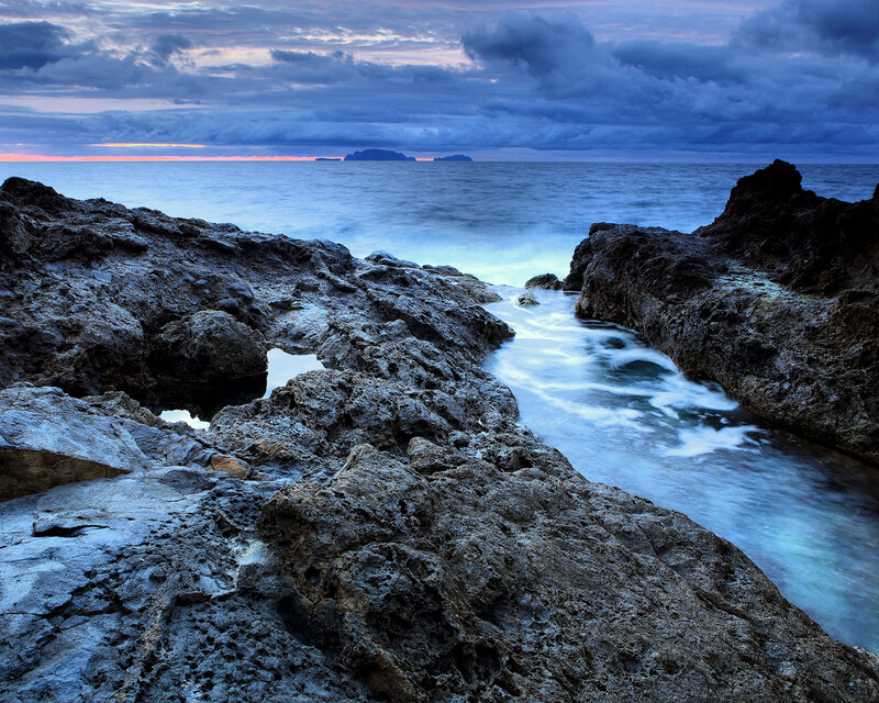 Rocky Coastline at Dusk — Clouds
