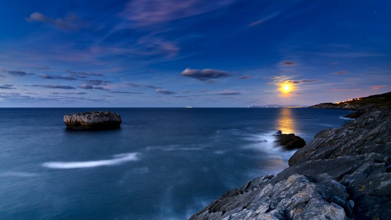 Rocky Coastline at Night — Blue, Serene, Photograph, Moon, Sea
