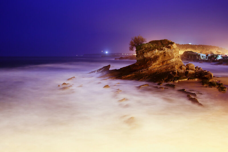 Rocky Coastline at Night — Purple