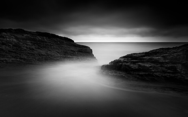 Rocky Coastline at Sea — Black, Dramatic