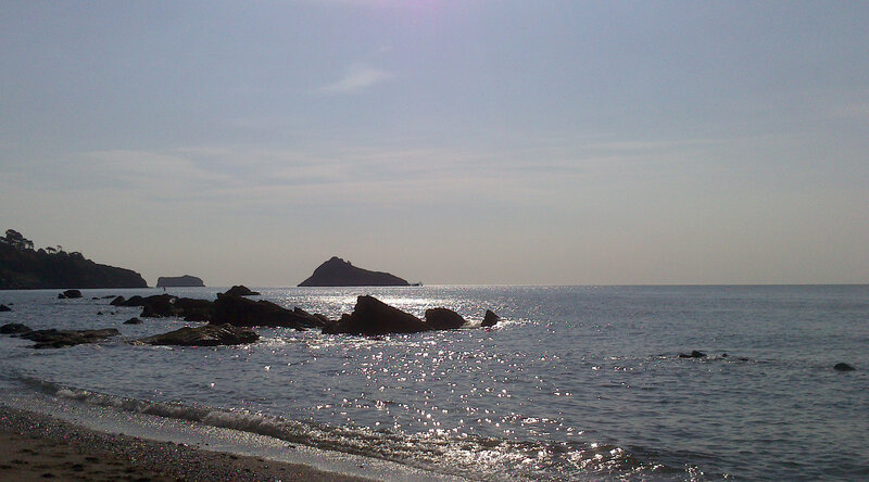 Rocky Coastline at Sea — Blue, Calm