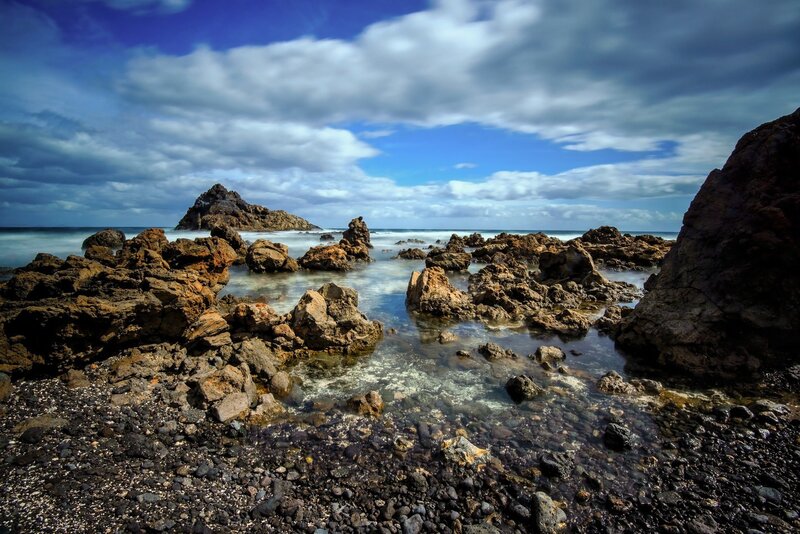 Rocky Coastline at Sea — Blue, Dramatic, Afternoon, Photograph, Rocks, Ocean