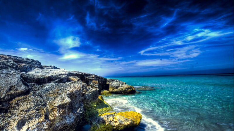 Rocky Coastline at Sea — Blue, Dramatic, Afternoon