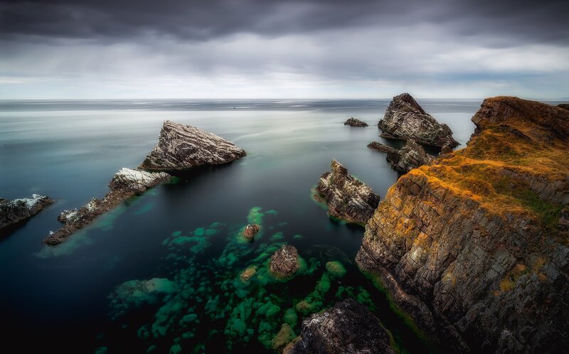 Rocky Coastline at Sea — Blue, Dramatic, Photograph, Rocks