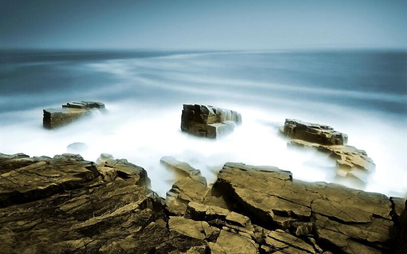 Rocky Coastline at Sea — Blue, Serene, Photograph, Rocks
